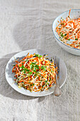 Grated vegetable salad with smoked almonds