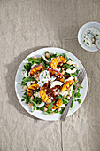Arugula salad with grilled peaches, white beans and mozzarella