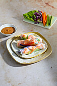 Shrimp spring rolls with peanut sauce