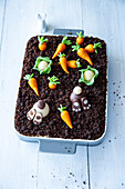 Easter tiramisu with marzipan carrots and a diving Easter bunny