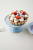 Tartelette with pistachio cream and strawberries