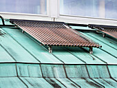 Solar thermal panel on a copper roof