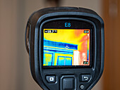 Thermal imaging camera assessing heat loss