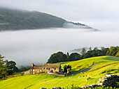 Mist over the slopes of Wansfell, Lake District, UK