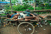 Homeless children sleeping in street, Dhaka, Bangladesh