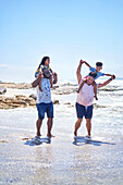 Family splashing in ocean