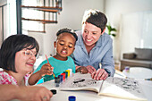 Mothers painting with son