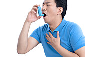 Man using inhaler