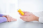 Doctor prescribing tablets
