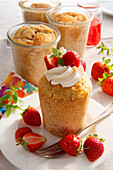 Small macadamia cakes from the jar with strawberry cream
