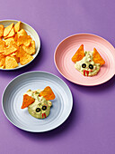 Guacamole bats with pepper triangles