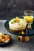 Pistachio tartlets with white chocolate mousse and physalis puree