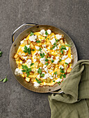 Omelette with potatoes, feta cheese and parsley