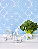 Broccoli tree with plastic animals