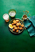 Deep-fried olives stuffed with ricotta and guindilla chilli