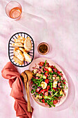 Italian salad with artichoke hearts and salami