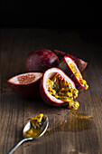 Sliced passion fruit on a wooden base