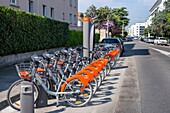 France,Rhone,Villeurbanne,Chateau Gaillard district,Louis Fort street,Velo'v is a self-service bicycle system set up in the Lyon Metropole