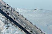 France,Manche,Mont Saint Michel bay listed as World Heritage by UNESCO,Mont Saint Michel,the footbridge by architect Dietmar Feichtinger and the Couesnon river at high tide