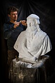 France,Indre et Loire,Chemille sur deme,the sculptor Ianek Kocher sculpting the bust of Leonardo da Vinci in Carrara marble in his workshop for the 500 years of the death of Leonardo da Vinci at the castle of Amboise