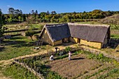France,Calvados,Herouville Saint Clair,Domaine de Beauregard,Ornavik Historical Park,reconstruction of a Carolingian village with its artisans and farmers,the big farm (aerial view)
