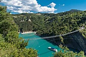 France,Isere,Trieves,Monteynard Lake,footbridge hiking trail,Ebron footbridge and Mira boat