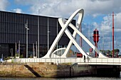 France,Seine Maritime,Le Havre,docks area,the swing bridge of the Docks which closes the Paul Vatine basin,Sciences Po building and the lightvessel (lightship) in the Eure basin in the background