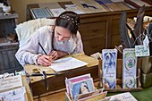 France,Vendee,Les Epesses,Le Puy du Fou historical theme park,Medieval city,Art craftswoman,calligrapher