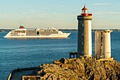 France,Finistere,the lighthouse of the Petit Minou at sunset and the ship Europa 2