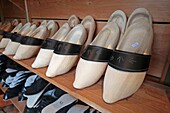 France,Haut Rhin,Lutterbach,sabotery Andre Haeberle,shoe maker Andre Haeberle at work,demonstration commented in front of visitors,his shoes are made of maple wood