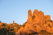 France,Var,Frejus,Esterel massif,the watchtower on Mount Vinaigre (641m) serves as a surveillance post for fires,cliffs of red rhyolite rocks of volcanic origin