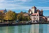 France,Haute Savoie,Annecy,the lake and the departure of the canal of Thiou dominated by the castle in autumn