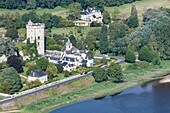 France,Maine et Loire,Loire valley listed as World Heritage by UNESCO,Gennes Val de Loire,Treves,the donjon and the church near the Loire river (aerial view)