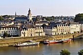 France,Maine et Loire,Angers,the city on the Maine river banks,the river port and Trinity church