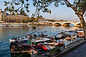 France,Paris,area listed as World Heritage by UNESCO,the barges at the Port des Tuileries with the Palais Bourbon in the background