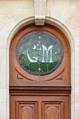 France,Meurthe et Moselle,Nancy,detail of a door in Art Nouveau style in Begonias street
