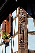 France,Haut Rhin,Kientzheim,house,wooden sculptured bas relief.