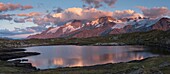France,High Alps,La Grave,on the Emparis plateau,panoramic view of Lake Noir facing the Meije massif at sunset