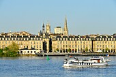 France,Gironde,Bordeaux,area listed as World Heritage by UNESCO,Richelieu quay,15th century Gothic Porte Cailhau or Porte du Palais,Pey-Berland tower and Saint Andre cathedral