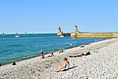 France,Seine Maritime,Pays de Caux,Cote d'Albatre (Alabaster Coast),Fecamp,the beach,lighthouse at the entrance of the harbour