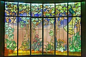 France,Meurthe et Moselle,Nancy,Ecole de Nancy (Nancy school) museum in the house that belonged to Antoine Corbin dedicated to Art Nouveau,stained glass window by Jacques Gruber,veranda named La Salle (the room in 1904