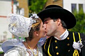 France,Finistere,parade of the 2015 Gorse Flower Festival in Pont Aven,Pont Aven bride's costume and Elliant's costume