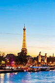 France,Paris,area listed as World Heritage by UNESCO,the banks of the Seine,the Alexandre III bridge and the Eiffel Tower