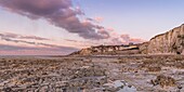 France,Somme,Ault,the village on its cliff in the light of the sunset,the low tide discovers the chalky plateau eaten by the sea and the flints that are flush