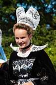 France,Finistere,parade of the 2015 Gorse Flower Festival in Pont Aven,Costume and headdress of Pont Aven