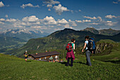 Hikers heading to the HornKopflhutte mountain hut. Kitzbuehel,Tyrol,Austria.