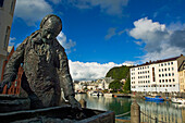 Norway,More og Romsdal,Statue nearby canal,Alesund