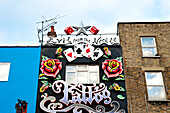 Tatoo Shop In Camden High Street As Part Of The Famous Camden Market,North London,London,Uk