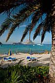 Spain,Looking out to Es Vedra Island from Cala d'Hort beach,Ibiza