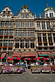 Belgium,People eating and drinking in outside cafes in Grand Place,Brussels